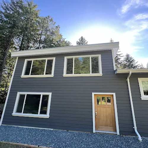 Modern charcoal siding & white trim