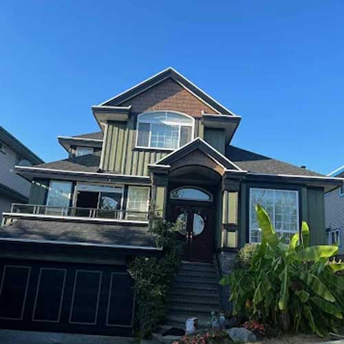 Craftsman home exterior in deep green