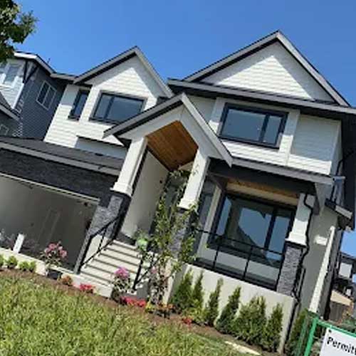 New build exterior — clean white finish