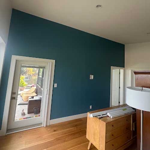 Bold teal interior accent wall